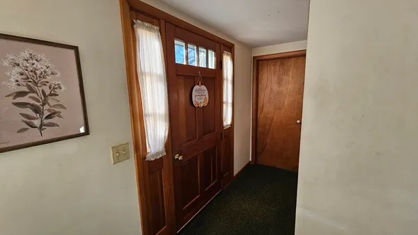 a view of a hallway with elevator
