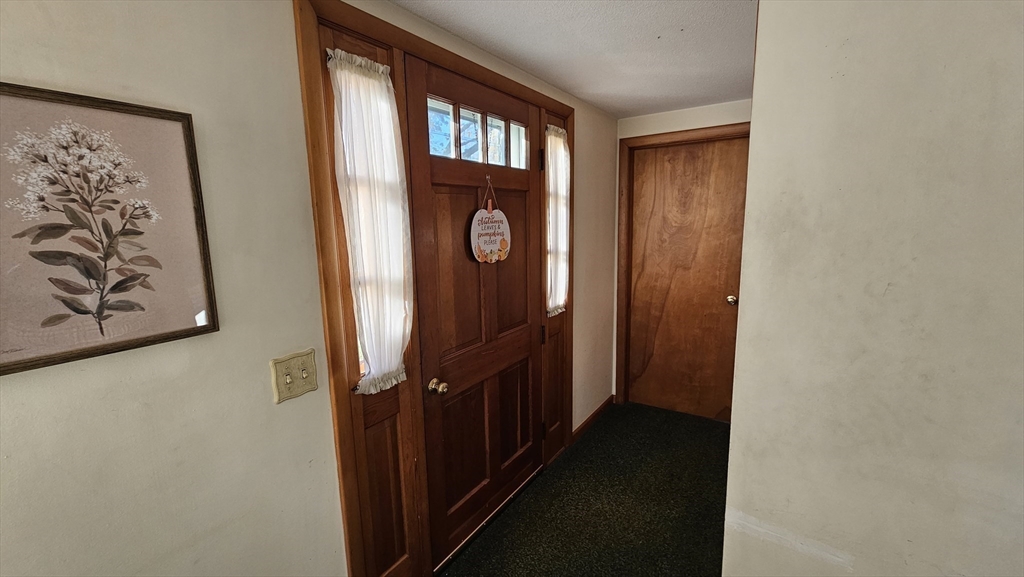 13 Capt Lathrop Drive Deerfield, MA 01373 - Photo 9 of 34 a view of a hallway with elevator