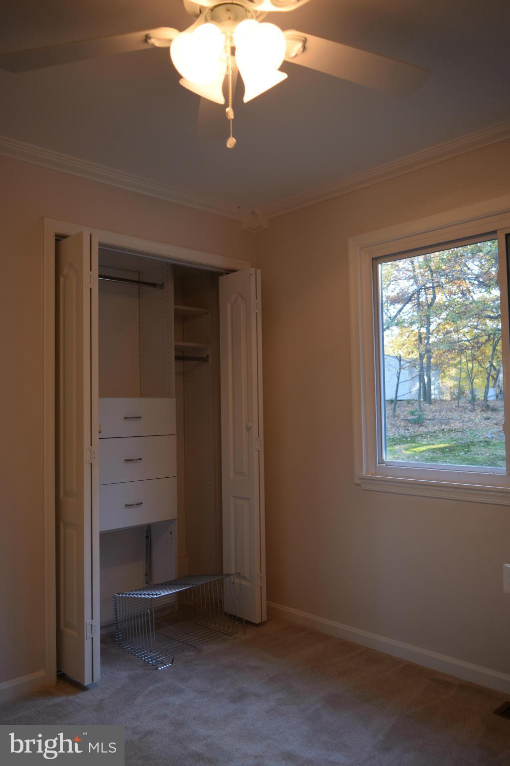 8654 Indian Springs Road Frederick, MD 21702 - Photo 22 of 30 an empty room with windows