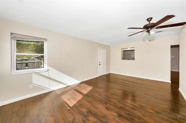 a view of house with backyard outdoor seating and barbeque oven