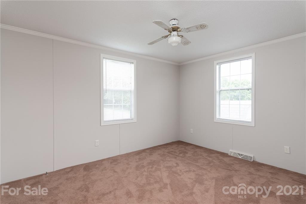 3034 St James Church Road Denver, NC 28037 - Photo 16 of 23 a view of an empty room with a window