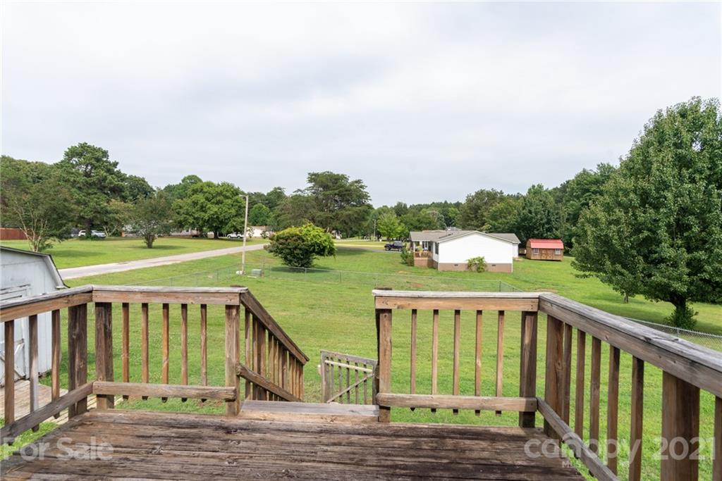 3034 St James Church Road Denver, NC 28037 - Photo 19 of 23 a view of a house with a yard