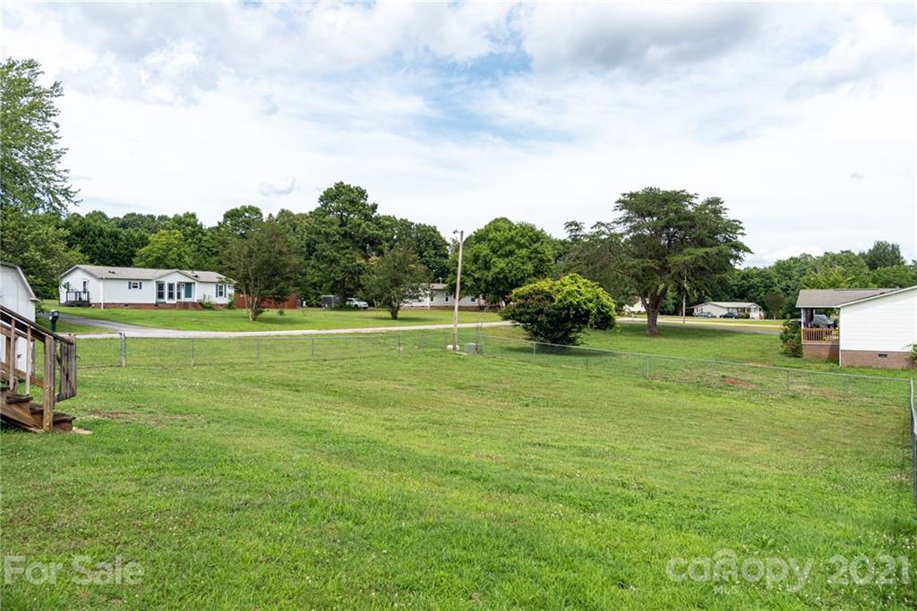 3034 St James Church Road Denver, NC 28037 - Photo 20 of 23 a view of a park with large trees