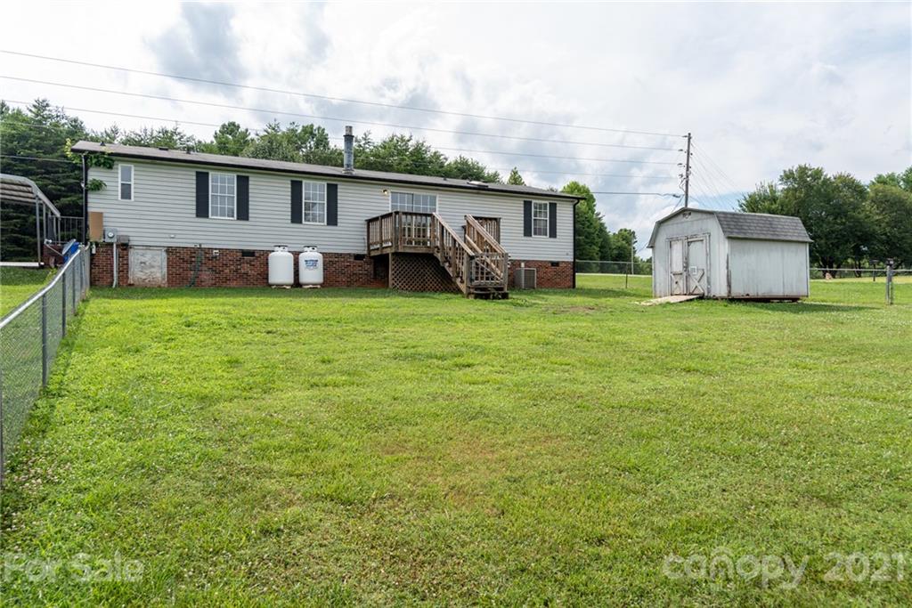 3034 St James Church Road Denver, NC 28037 - Photo 21 of 23 a front view of a house with garden