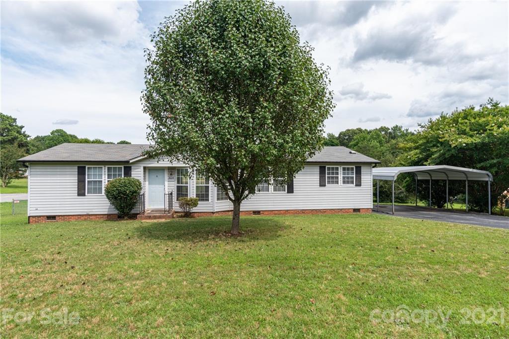 3034 St James Church Road Denver, NC 28037 - Photo 23 of 23 a front view of a house with a yard