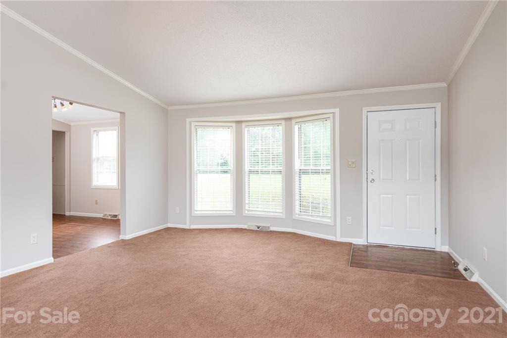3034 St James Church Road Denver, NC 28037 - Photo 6 of 23 a view of an empty room with a window