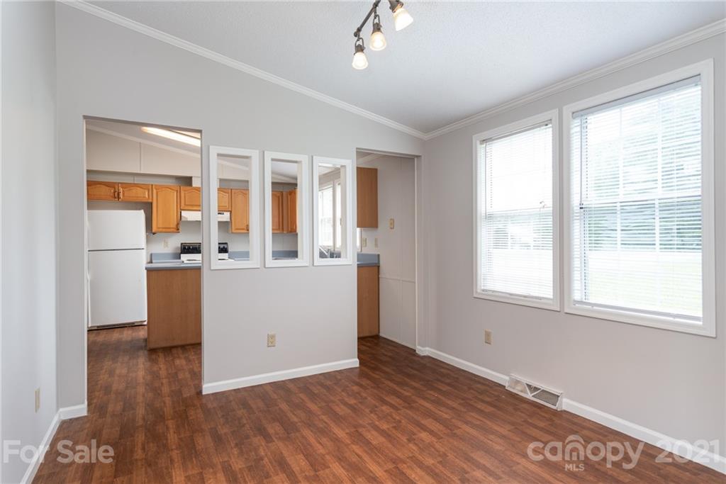 3034 St James Church Road Denver, NC 28037 - Photo 7 of 23 a view of kitchen with furniture and wooden floor