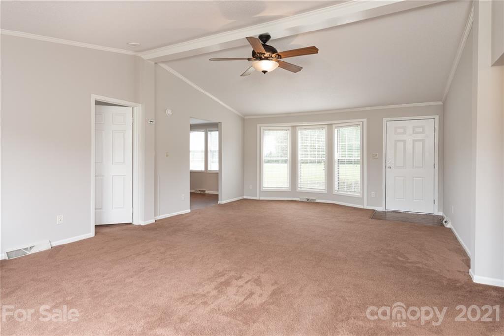 3034 St James Church Road Denver, NC 28037 - Photo 9 of 23 a view of an empty room with a window
