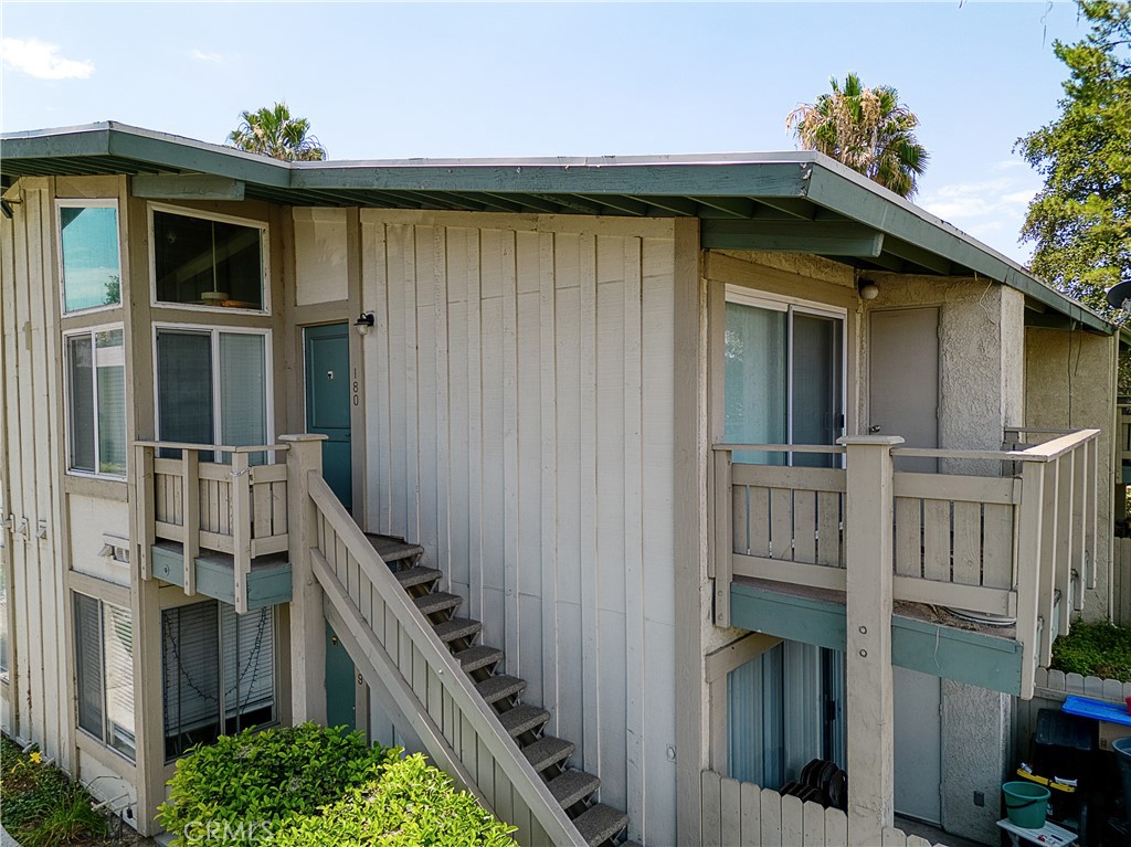 1800 East Old Ranch Road, Unit 180 Colton, CA 92324 - Photo 1 of 1 a front view of a house with balcony