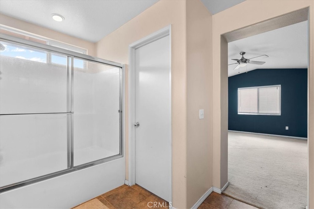 1474 Albillo Loop Perris, CA 92571 - Photo 21 of 35 a view of an entryway with a hallway