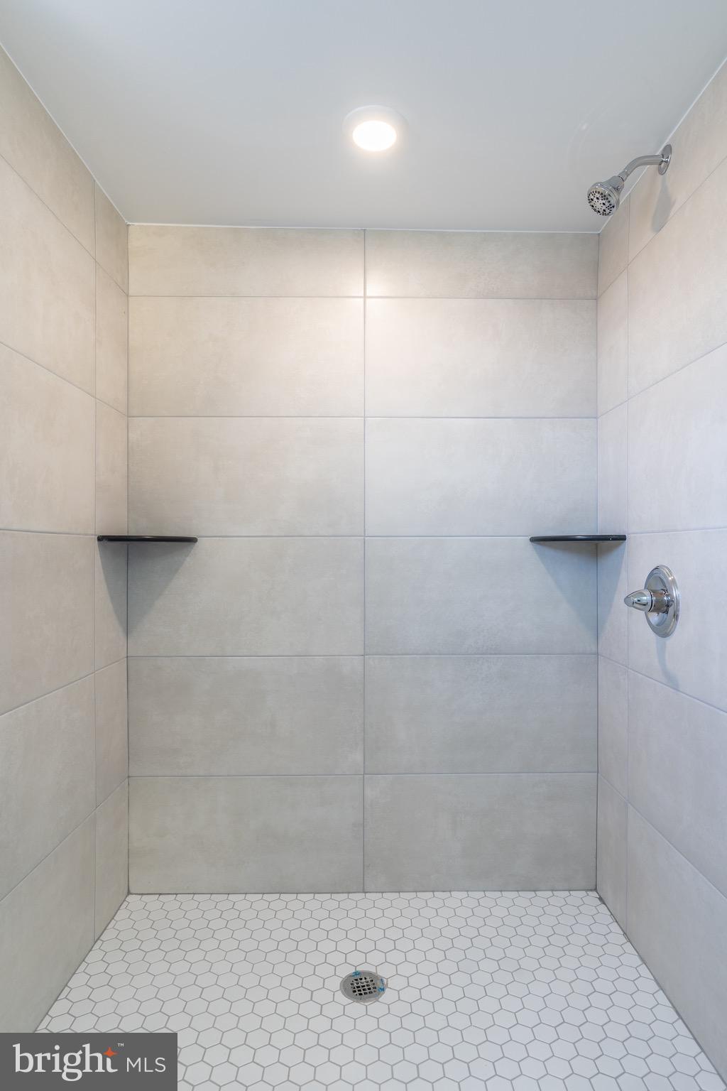 2500 North Mascher Street, Unit 9 Philadelphia, PA 19133 - Photo 15 of 17 a bathroom with a shower