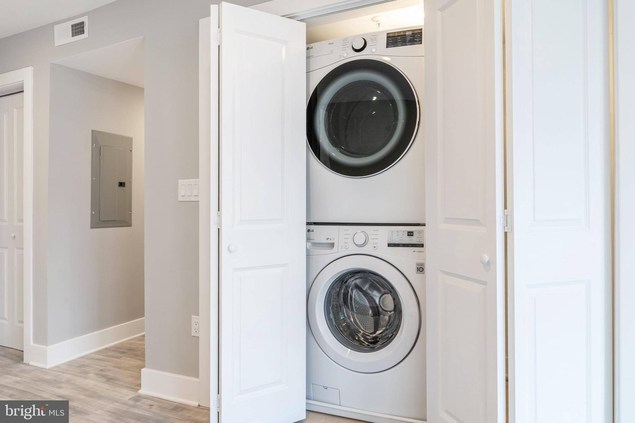 2500 North Mascher Street, Unit 9 Philadelphia, PA 19133 - Photo 8 of 17 a view of a hallway with washer and dryer