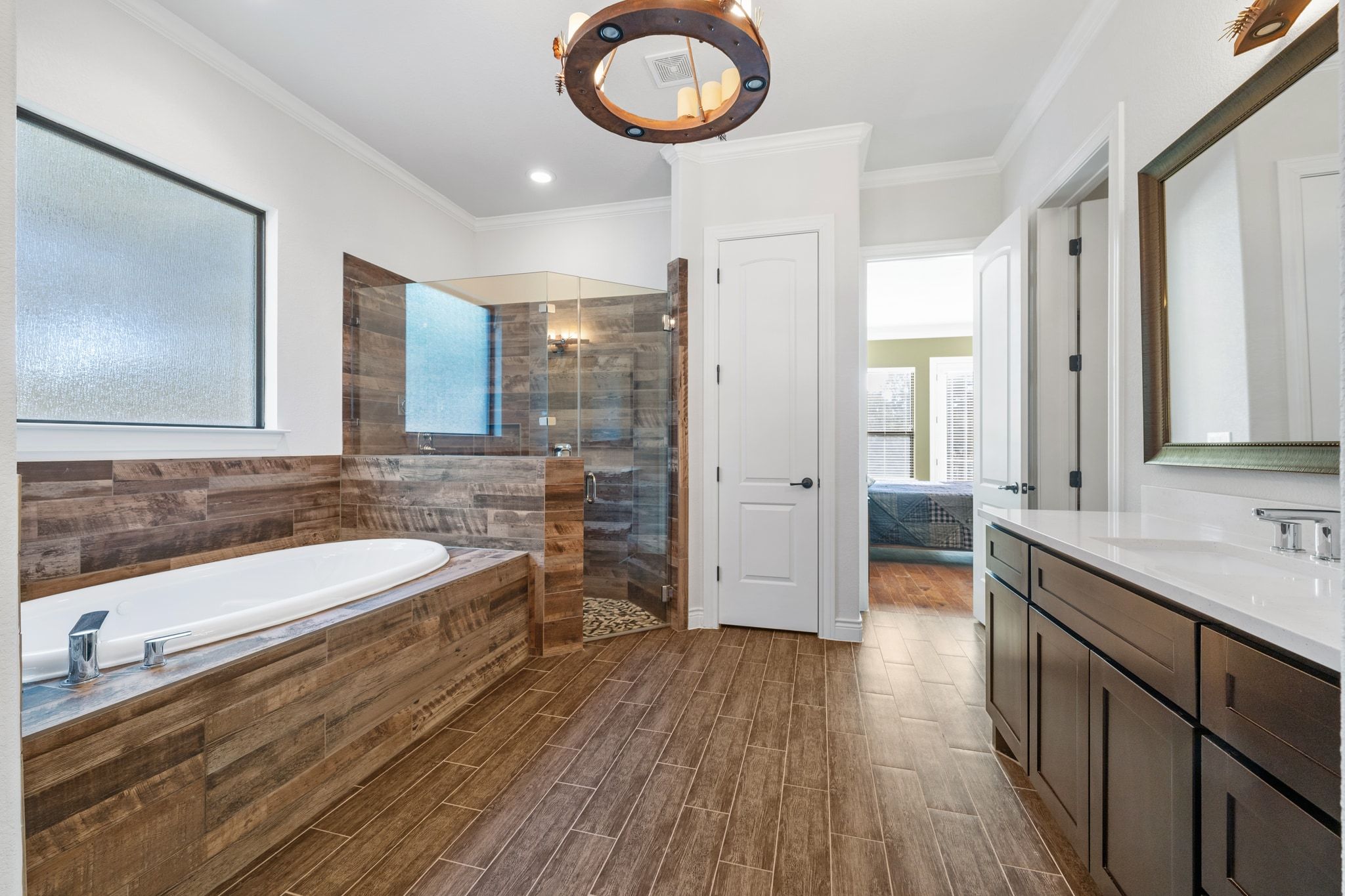 20607 Thurman Bend Road Spicewood, TX 78669 - Photo 15 of 39 a bathroom with a sink and a mirror