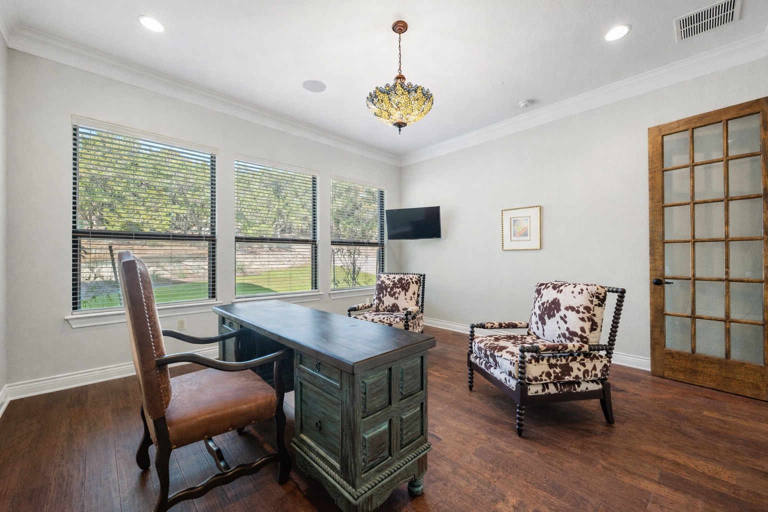 20607 Thurman Bend Road Spicewood, TX 78669 - Photo 22 of 39 a dining room with furniture and window