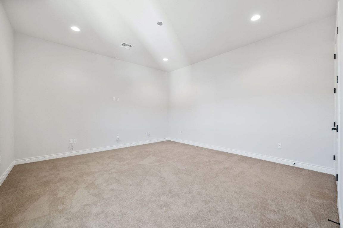 20607 Thurman Bend Road Spicewood, TX 78669 - Photo 23 of 40 Media room - home theater, featuring recessed lighting