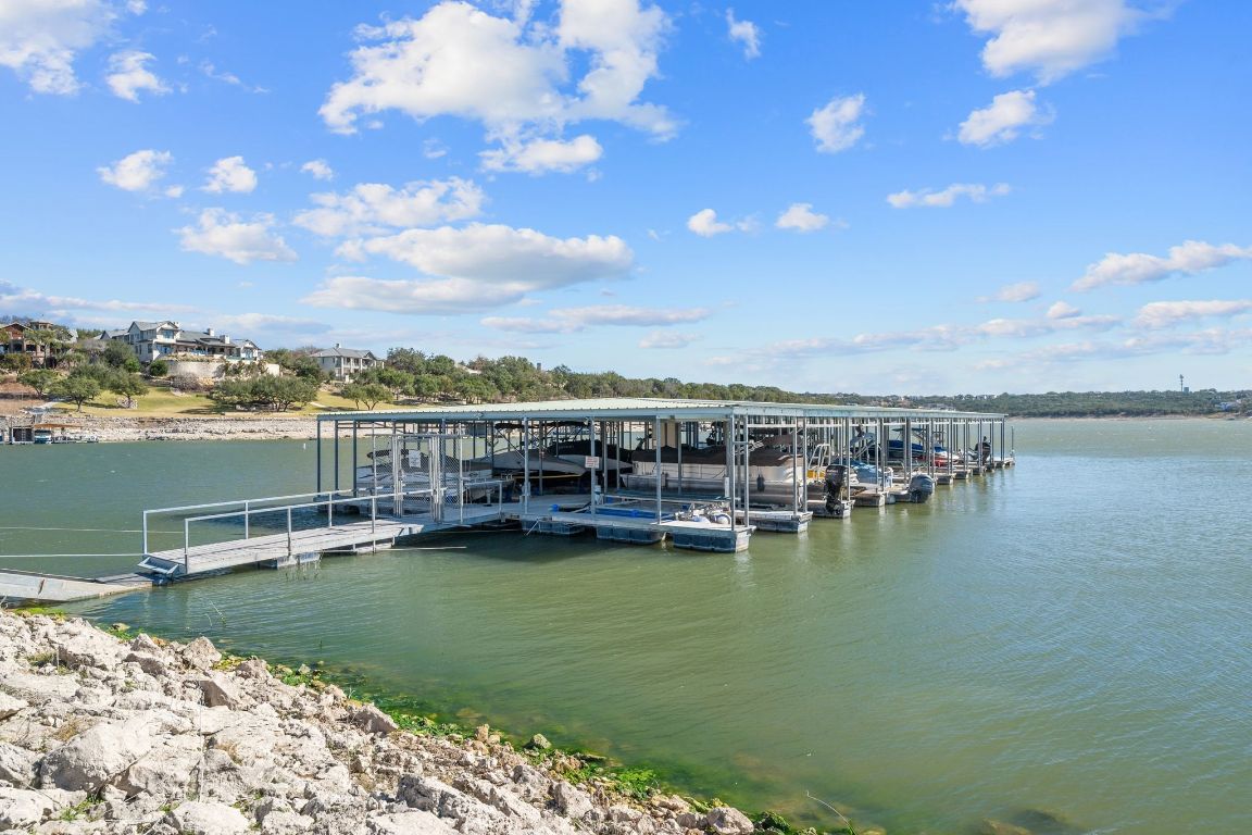 20607 Thurman Bend Road Spicewood, TX 78669 - Photo 32 of 40 Dock featuring a water view
