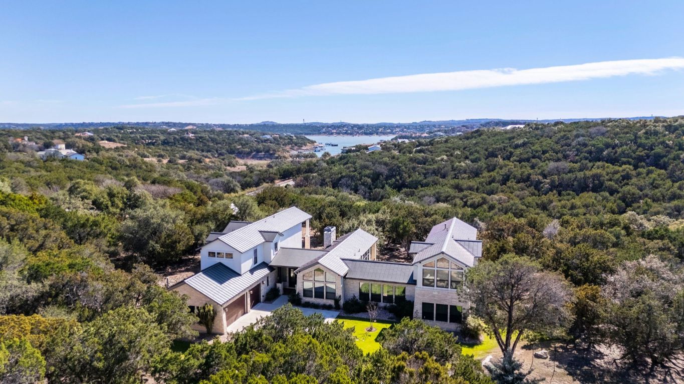 20607 Thurman Bend Road Spicewood, TX 78669 - Photo 33 of 40 Bird's eye view of a forest and a large body of water