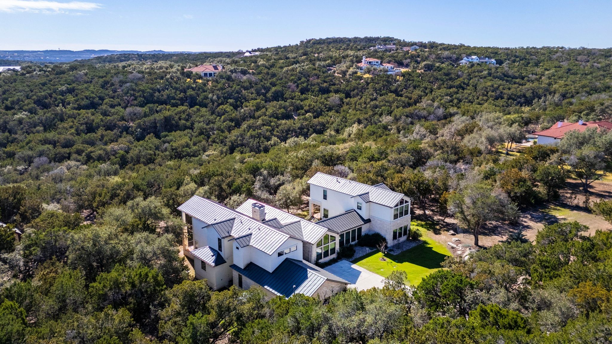 20607 Thurman Bend Road Spicewood, TX 78669 - Photo 4 of 39 an aerial view of a house with a yard