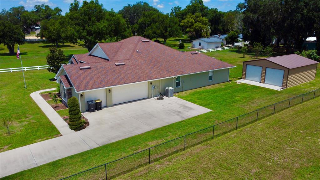 3934 Connersville Road Bartow, FL 33830 - Photo 76 of 81 an aerial view of a house with garden space and street view