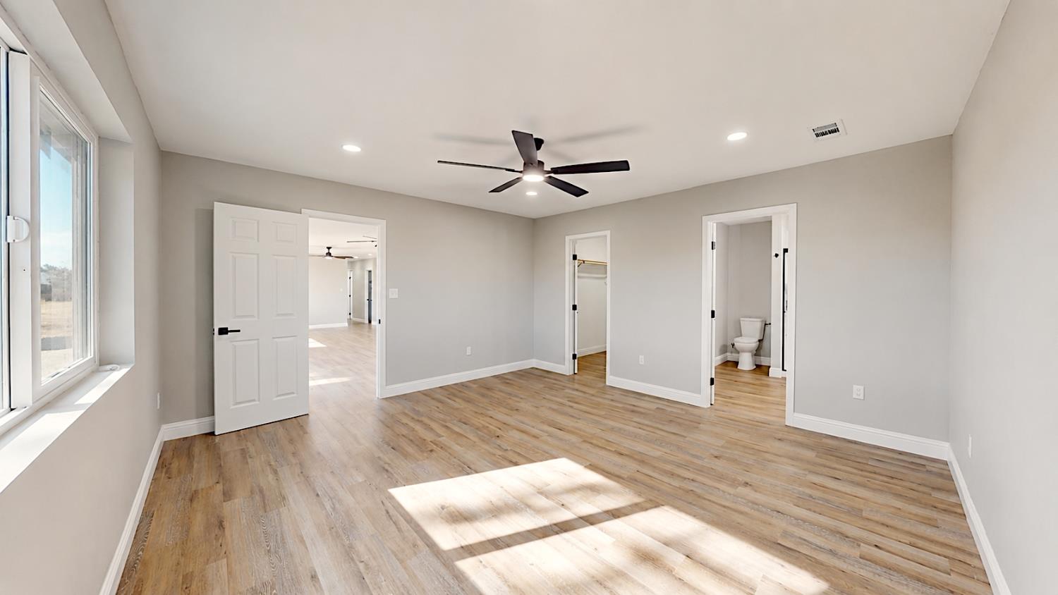 4728 Zorro Road La Grange, CA 95329 - Photo 38 of 56 Spacious Master Bedroom with wood-finish flooring, recessed lighting, ceiling fan, and white trim