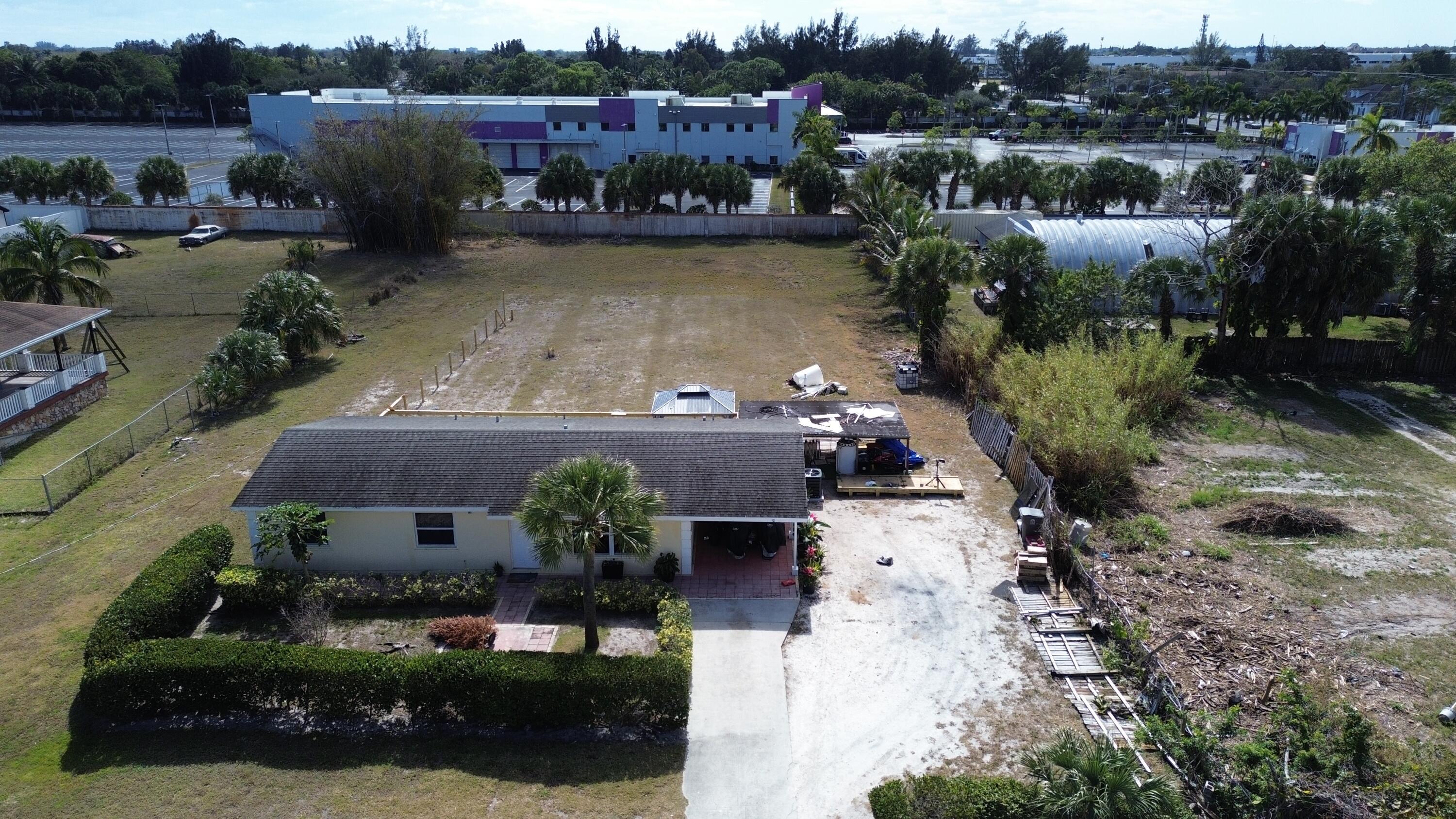 2920 Palmarita Road West Palm Beach, FL 33406 - Photo 6 of 17 an aerial view of houses with yard