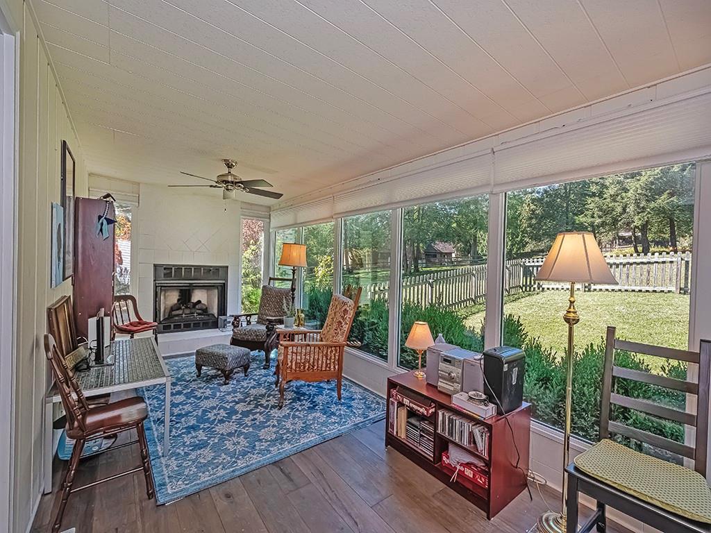9745 Lindsay Road Pittsburgh, PA 15237 - Photo 15 of 36 a living room with furniture large windows and wooden floor