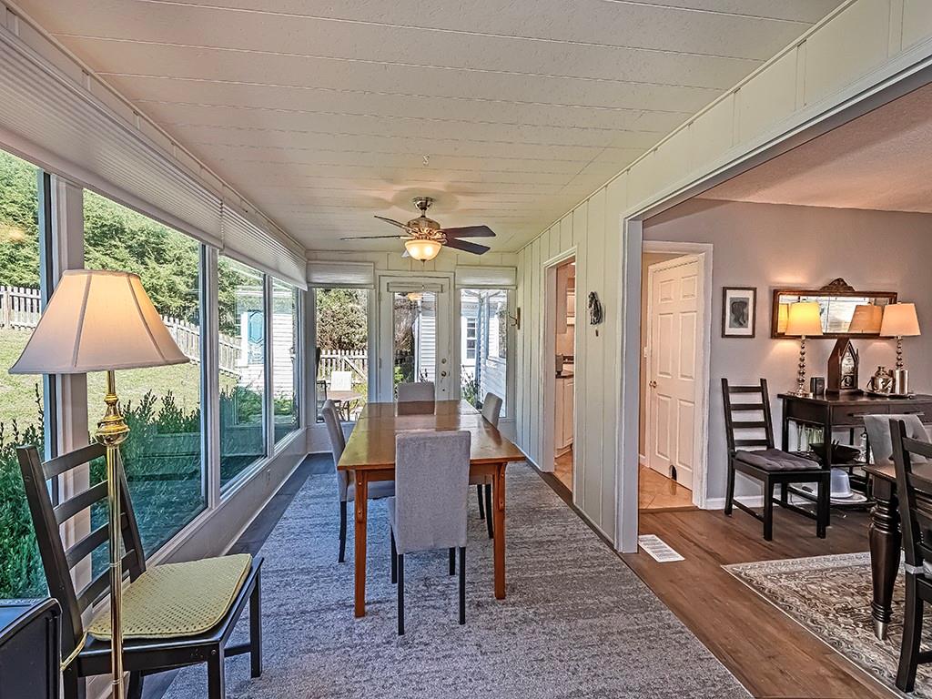 9745 Lindsay Road Pittsburgh, PA 15237 - Photo 16 of 36 a view of a dining room with furniture window and wooden floor