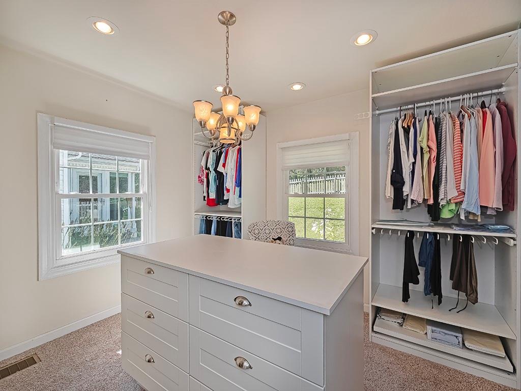9745 Lindsay Road Pittsburgh, PA 15237 - Photo 20 of 36 a view of a room that has a bed and a window in it