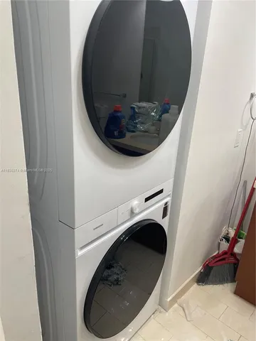 a close view of a utility room with a washer and dryer