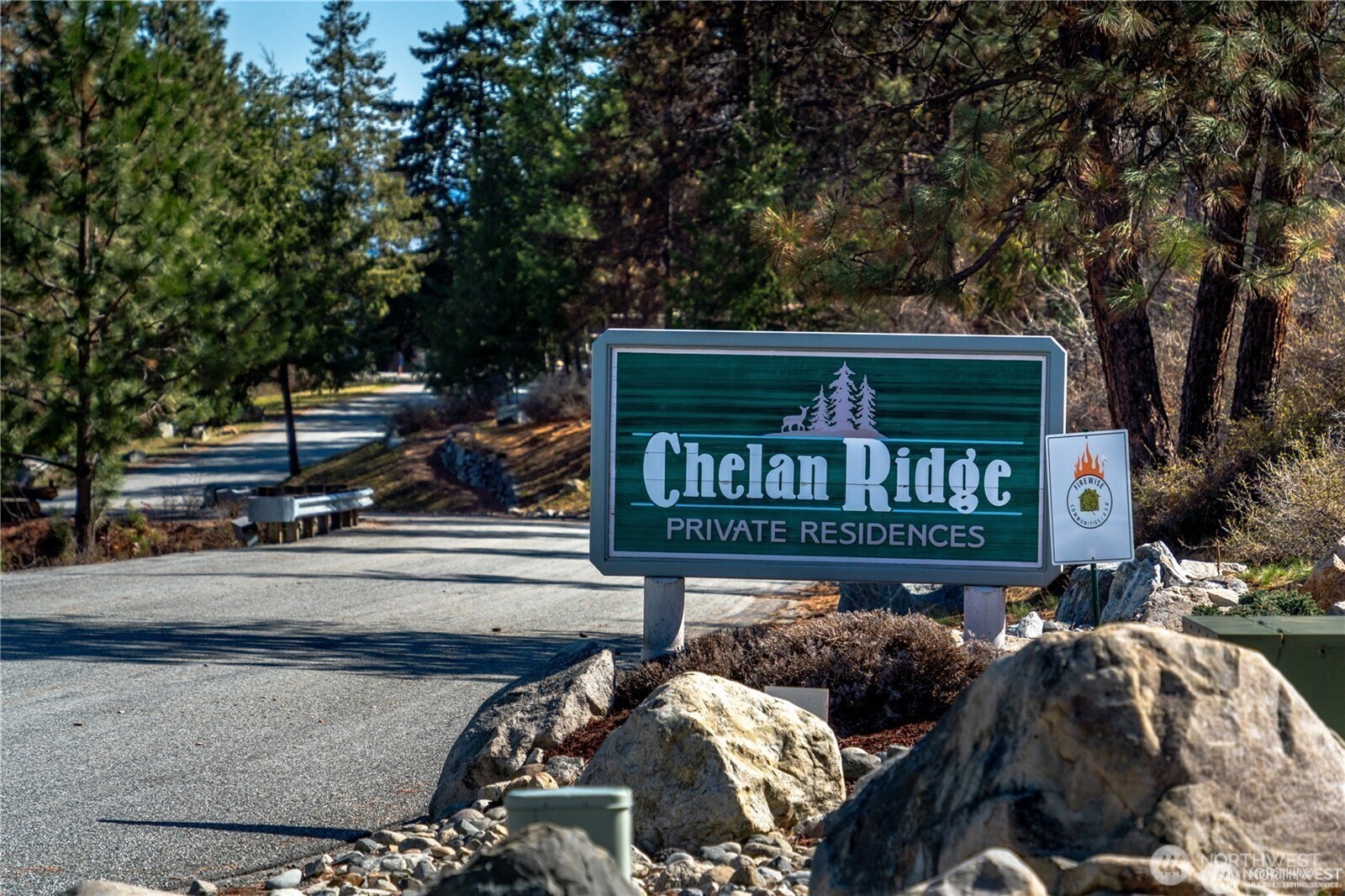 7365 Ridgeview Drive Chelan, WA 98816 - Photo 17 of 17 a sign on the side of a street