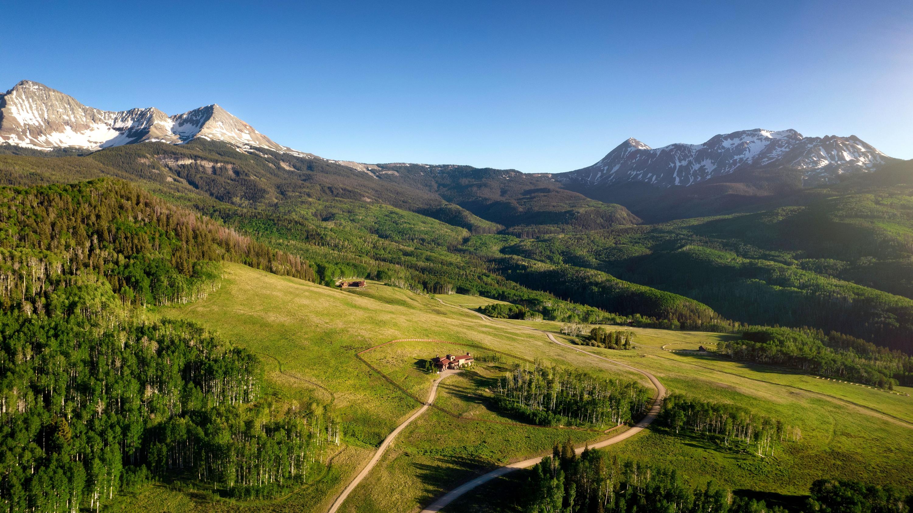 397 Muddy Creek Placerville, CO 81430 - Photo 3 of 22 a view of a house with a mountain