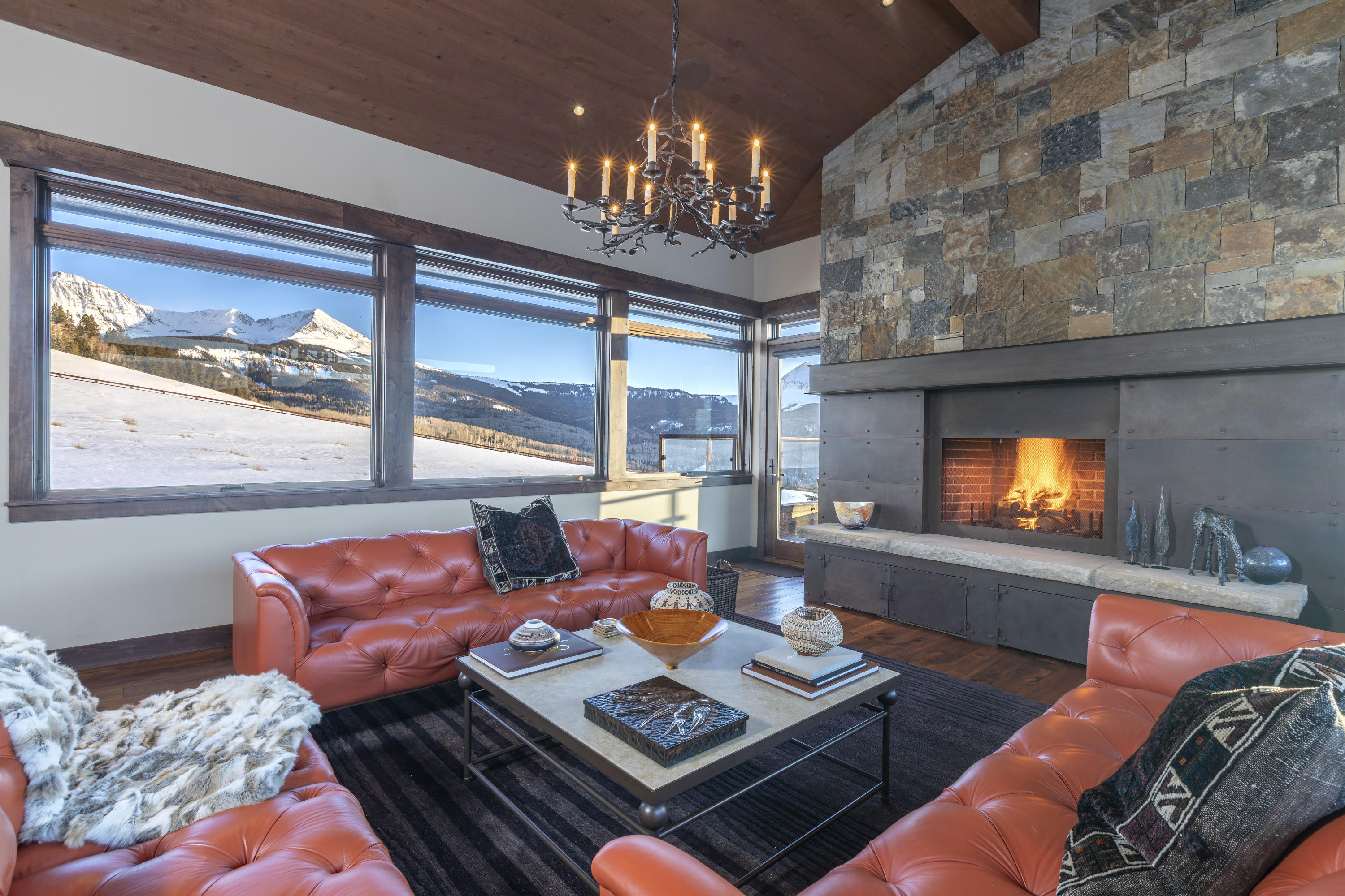 397 Muddy Creek Placerville, CO 81430 - Photo 5 of 22 a living room with furniture and a chandelier