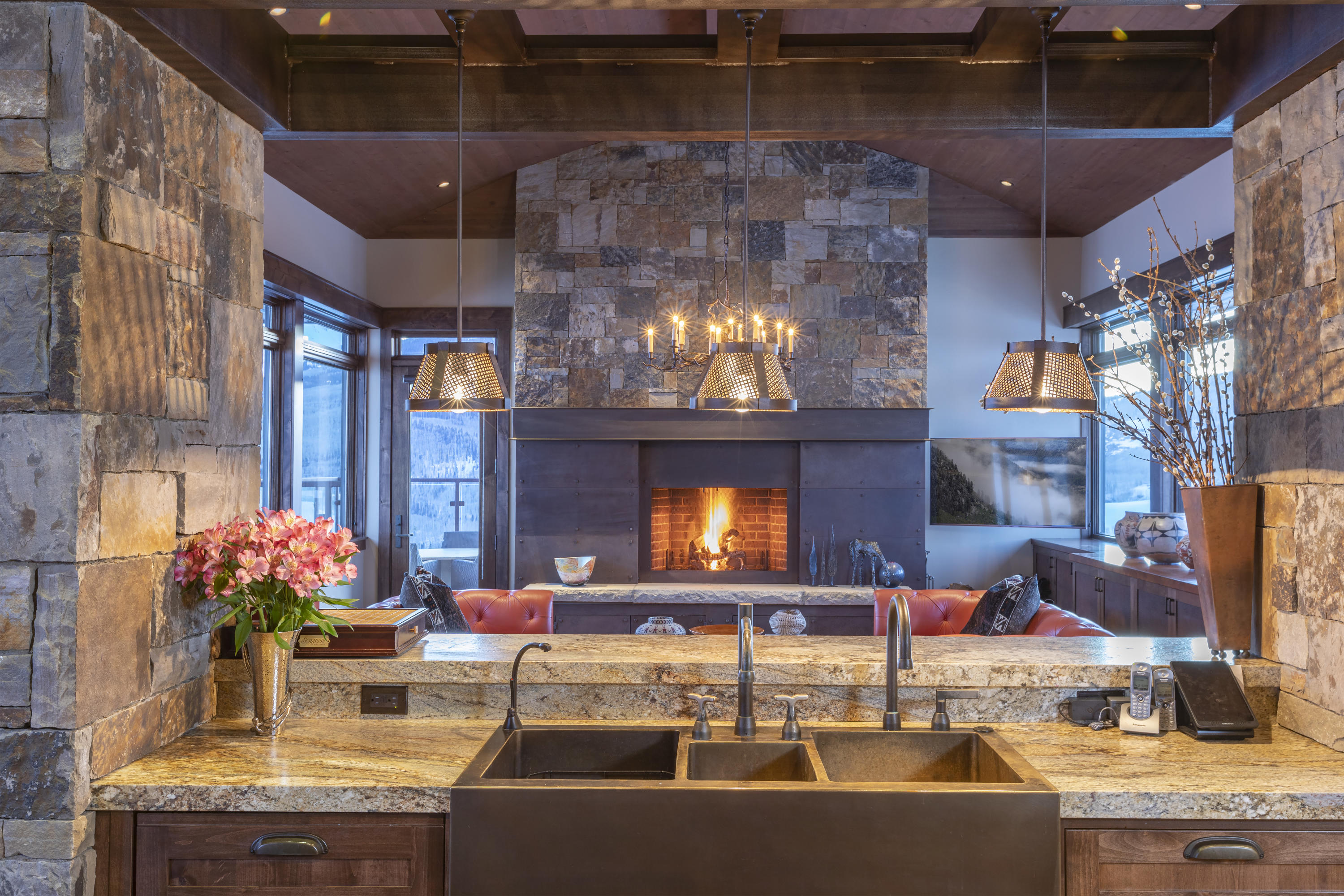 397 Muddy Creek Placerville, CO 81430 - Photo 7 of 22 a room with fireplace and flowers