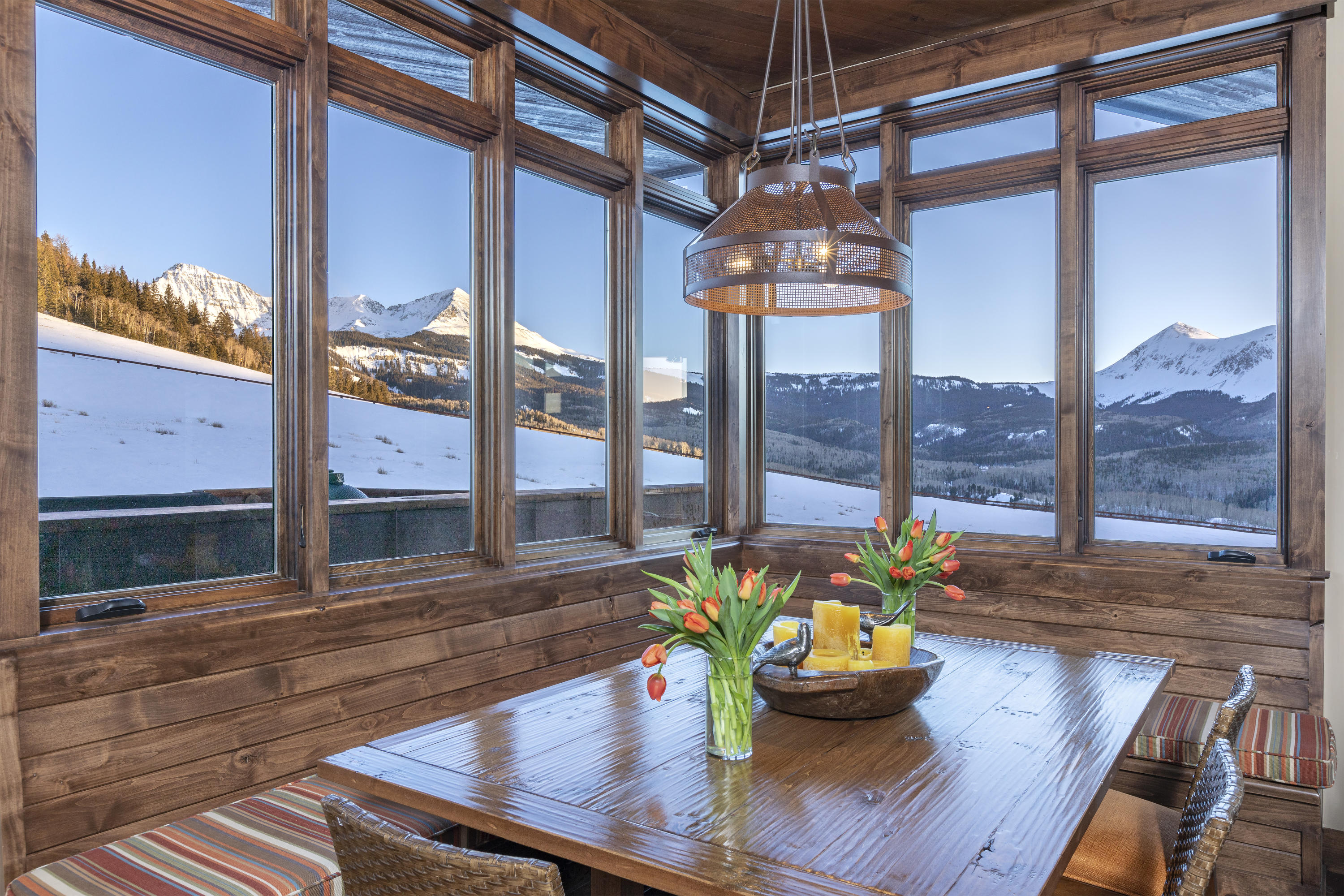 397 Muddy Creek Placerville, CO 81430 - Photo 10 of 22 a living room with couches and dining table with wooden floor