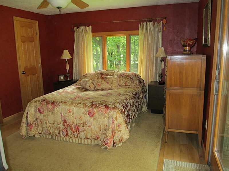 147 Fire Tower Road Champion, PA 15622 - Photo 10 of 21 Master Bedroom. Beautifully decorated master bedroom with large closet and door to the deck where you can enjoy your morning coffee!