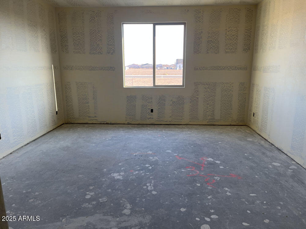 7631 West Tether Trail Peoria, AZ 85383 - Photo 7 of 14 an empty room with a window