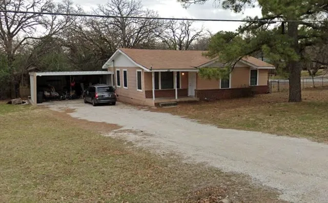 front view of a house with yard