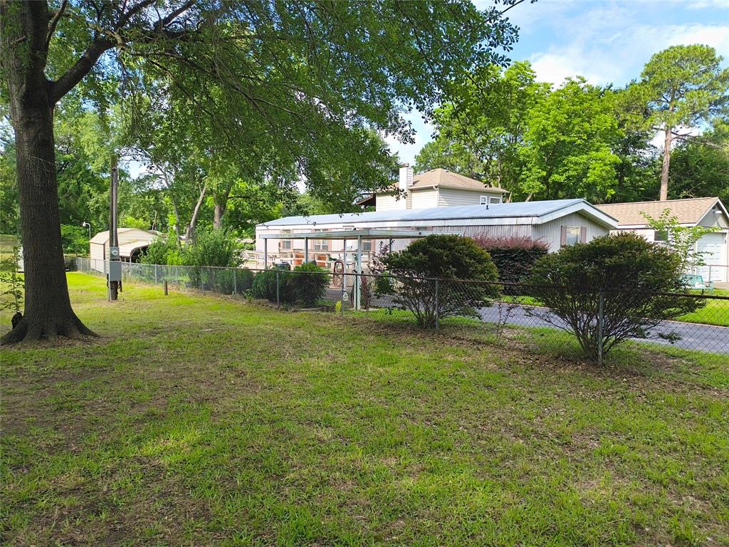 180 Arrowhead Street Mabank, TX 75156 - Photo 7 of 26 a view of a house with a yard