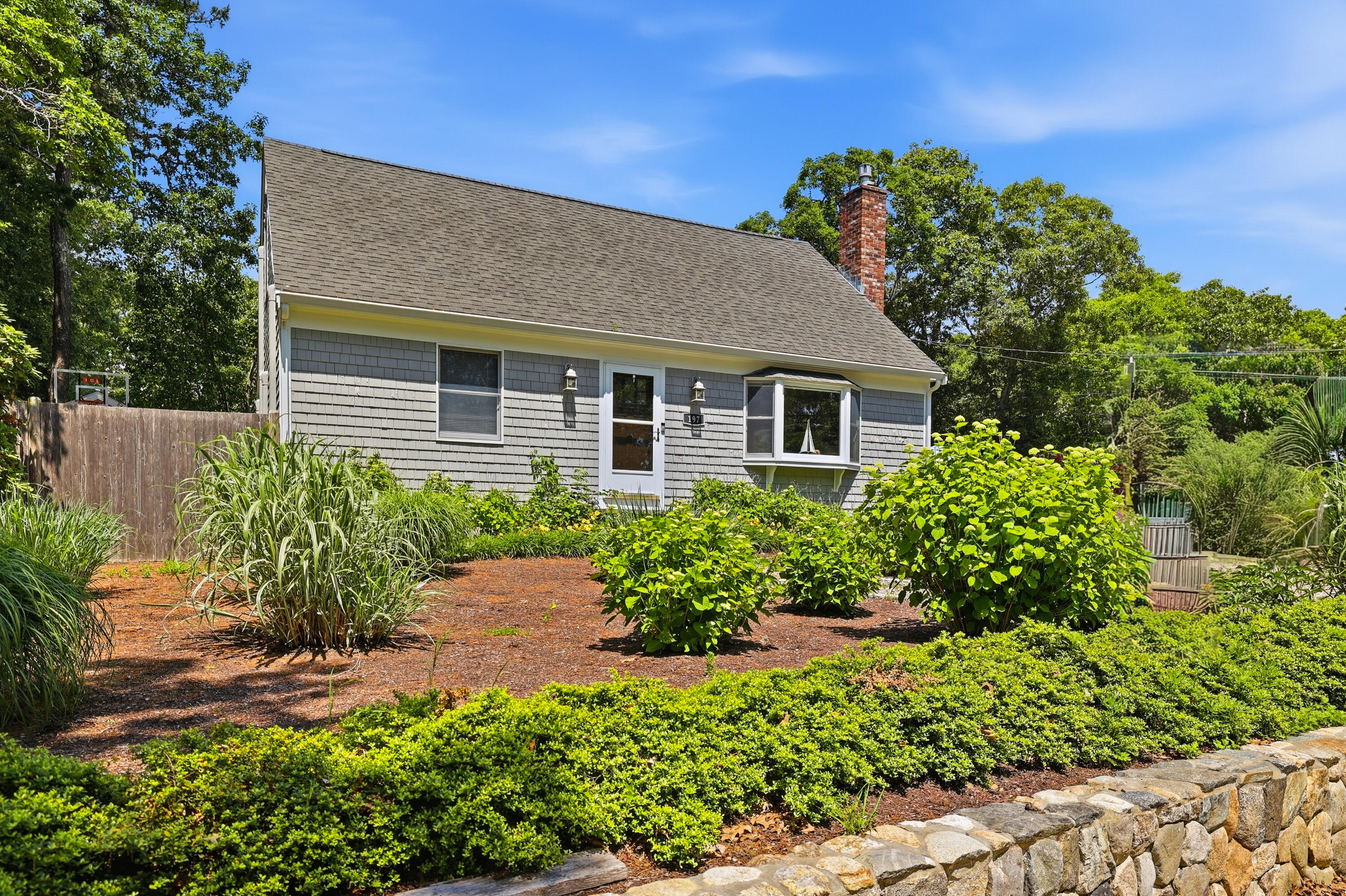 197 Monomoscoy Road Mashpee, MA 02649 - Photo 3 of 50 10-197 Monomoscoy New Exteriors-11