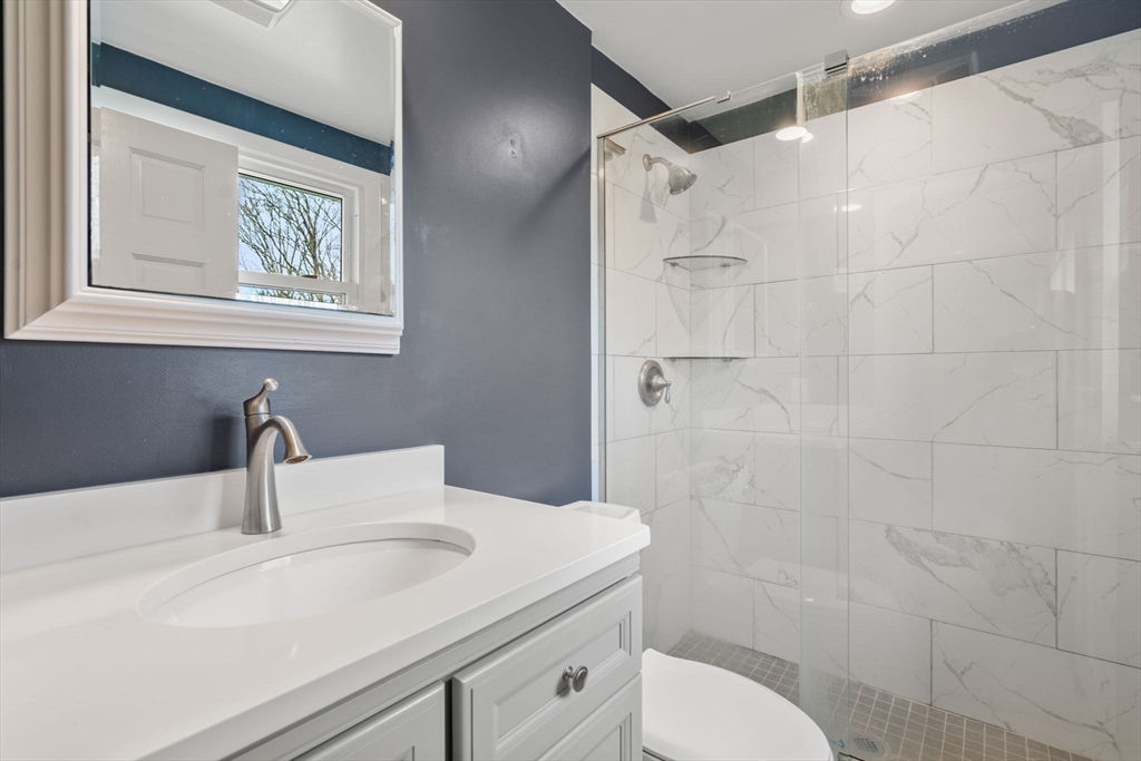 80 Oak Hill Drive Sharon, MA 02067 - Photo 22 of 36 a bathroom with a sink a toilet and shower