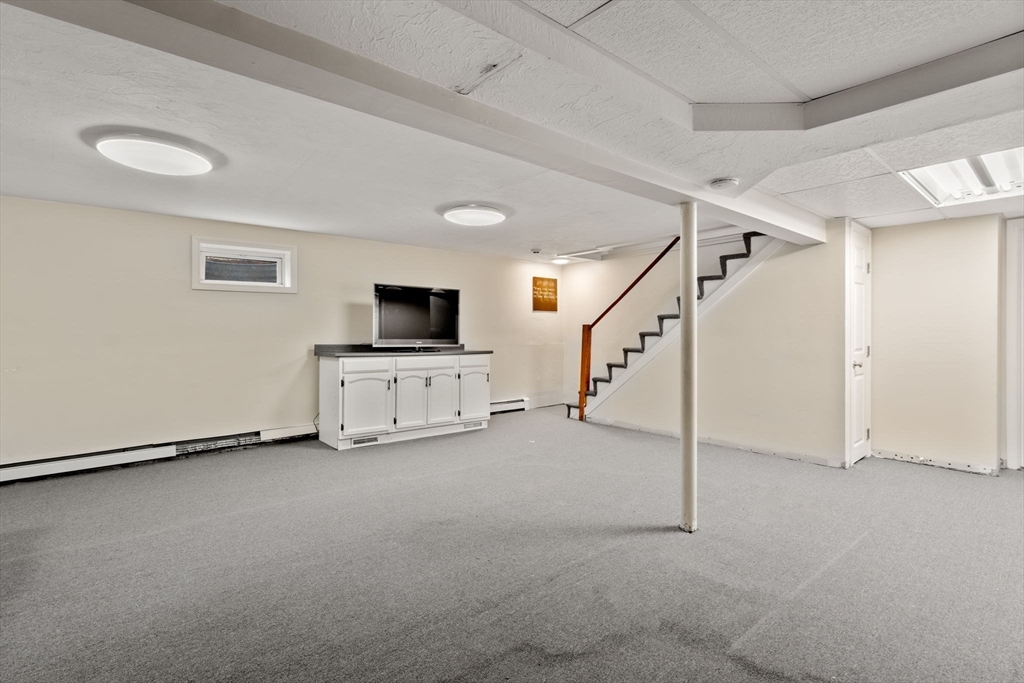 80 Oak Hill Drive Sharon, MA 02067 - Photo 24 of 36 a view of a livingroom with an empty room and white walls