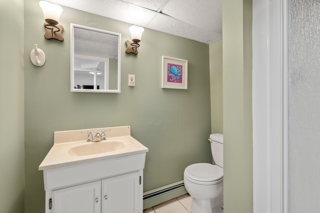 80 Oak Hill Drive Sharon, MA 02067 - Photo 26 of 36 a bathroom with a toilet sink and mirror