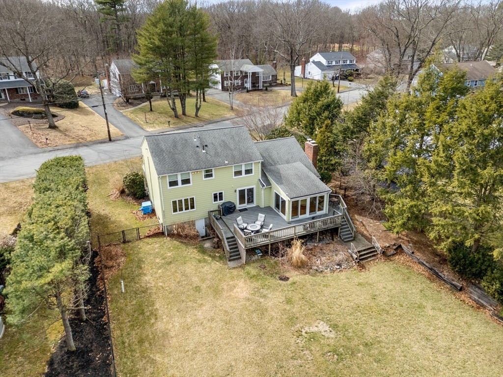 80 Oak Hill Drive Sharon, MA 02067 - Photo 31 of 36 an aerial view of a house with a yard and trees