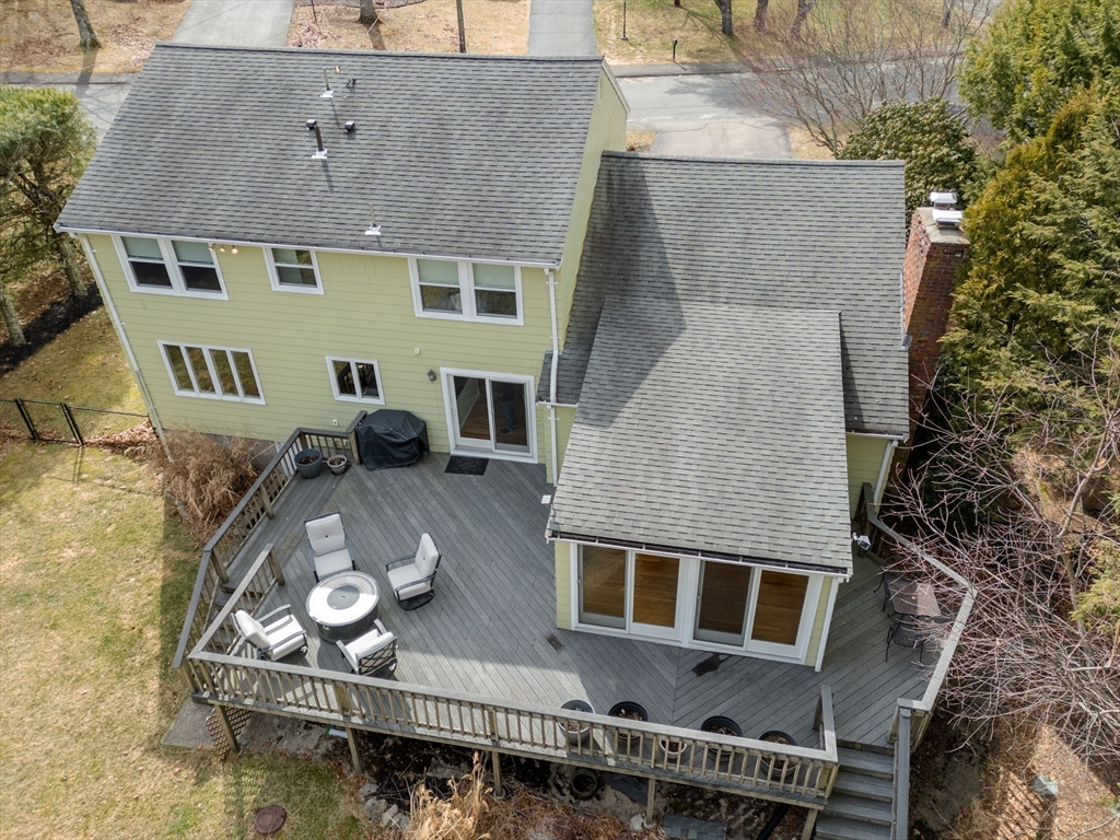 80 Oak Hill Drive Sharon, MA 02067 - Photo 32 of 36 a aerial view of a house with table and chairs
