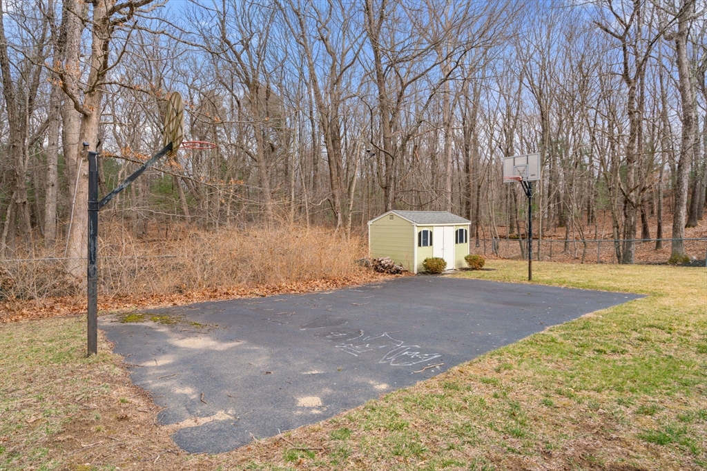 80 Oak Hill Drive Sharon, MA 02067 - Photo 33 of 36 a house with trees in front of it