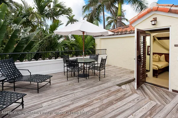 a view of a terrace with furniture