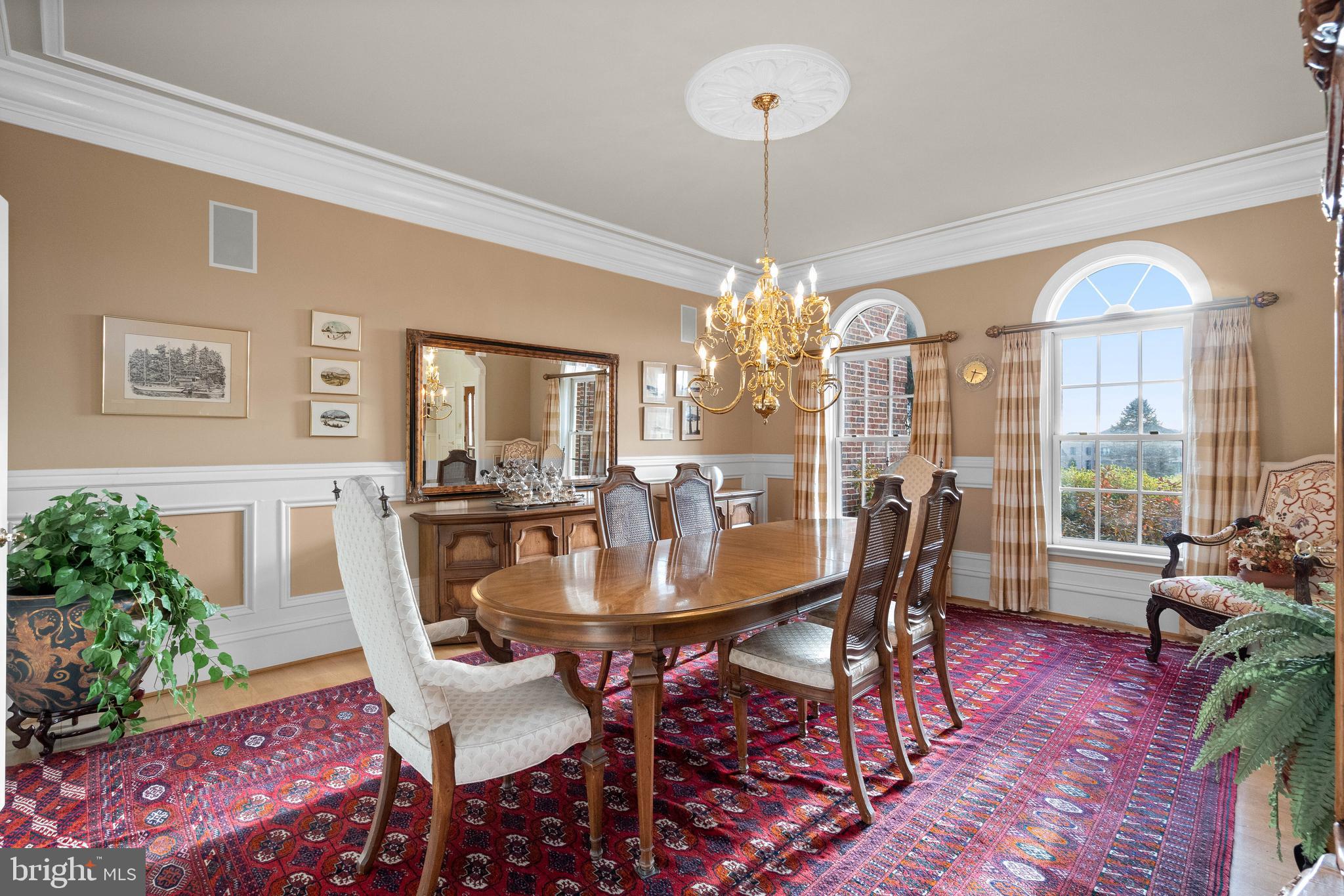 37120 Devon Wick Lane Purcellville, VA 20132 - Photo 16 of 66 a view of a dining room with furniture window and wooden floor