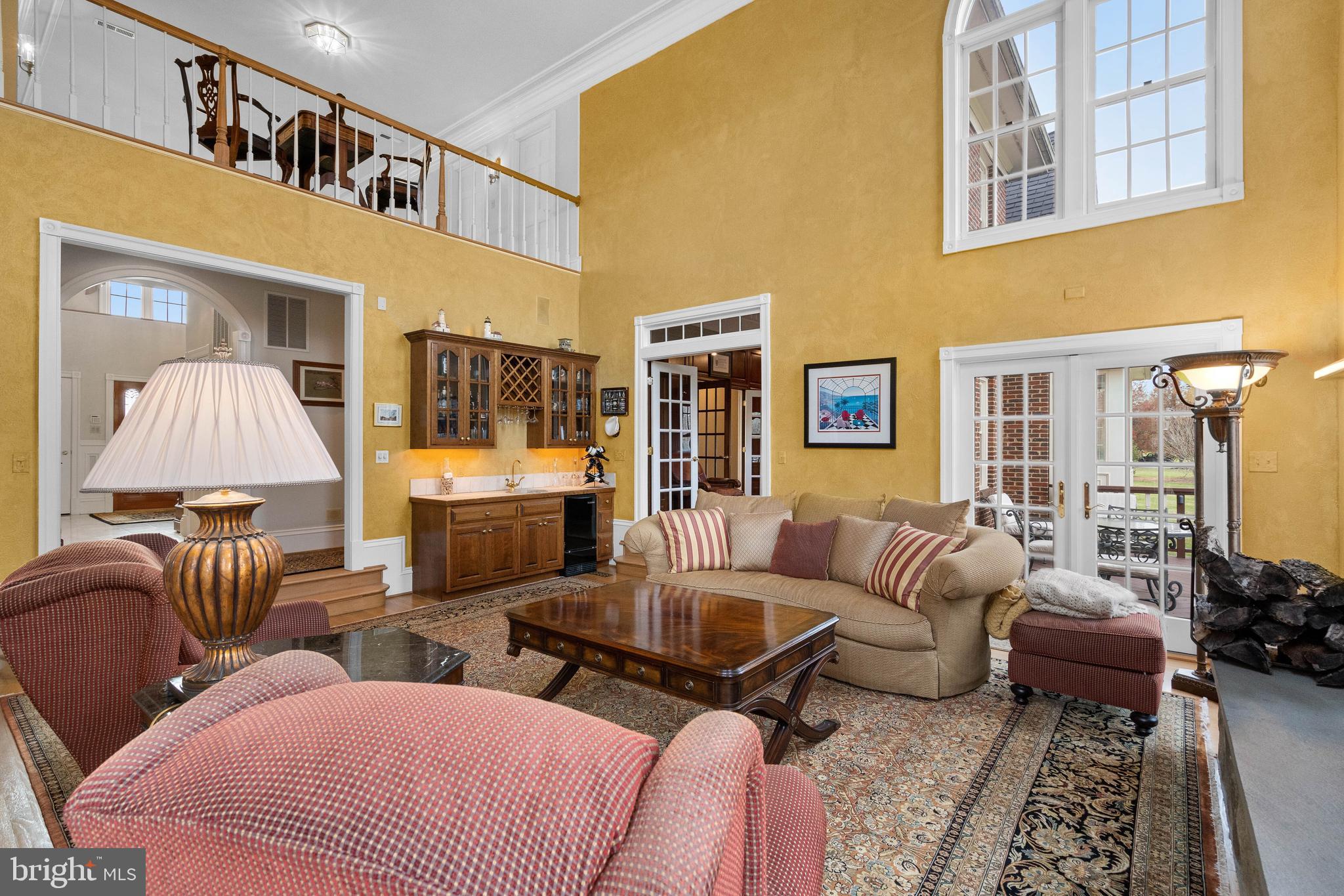 37120 Devon Wick Lane Purcellville, VA 20132 - Photo 19 of 66 a living room with furniture and a lamp