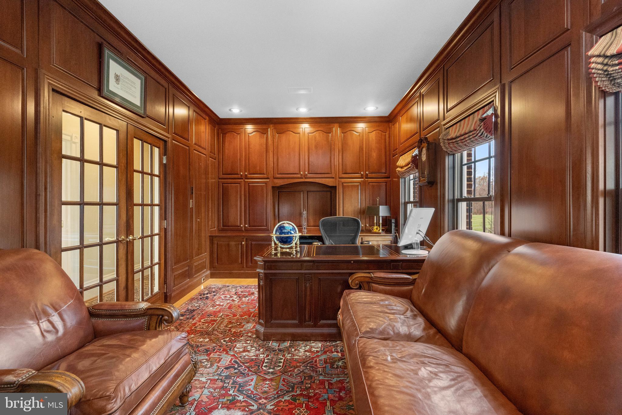 37120 Devon Wick Lane Purcellville, VA 20132 - Photo 22 of 66 a living room with furniture fireplace and a large window