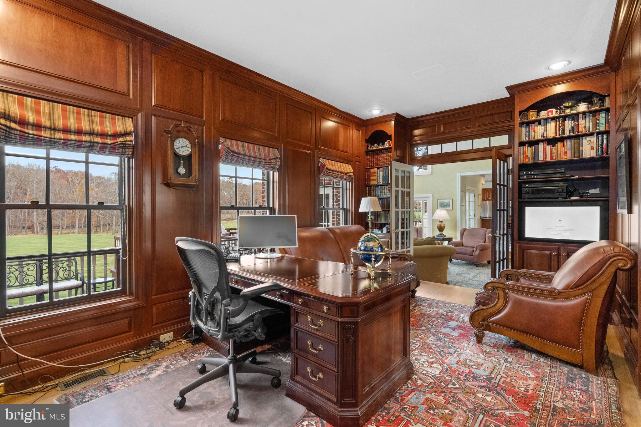 37120 Devon Wick Lane Purcellville, VA 20132 - Photo 23 of 66 a living room with furniture a window and a rug